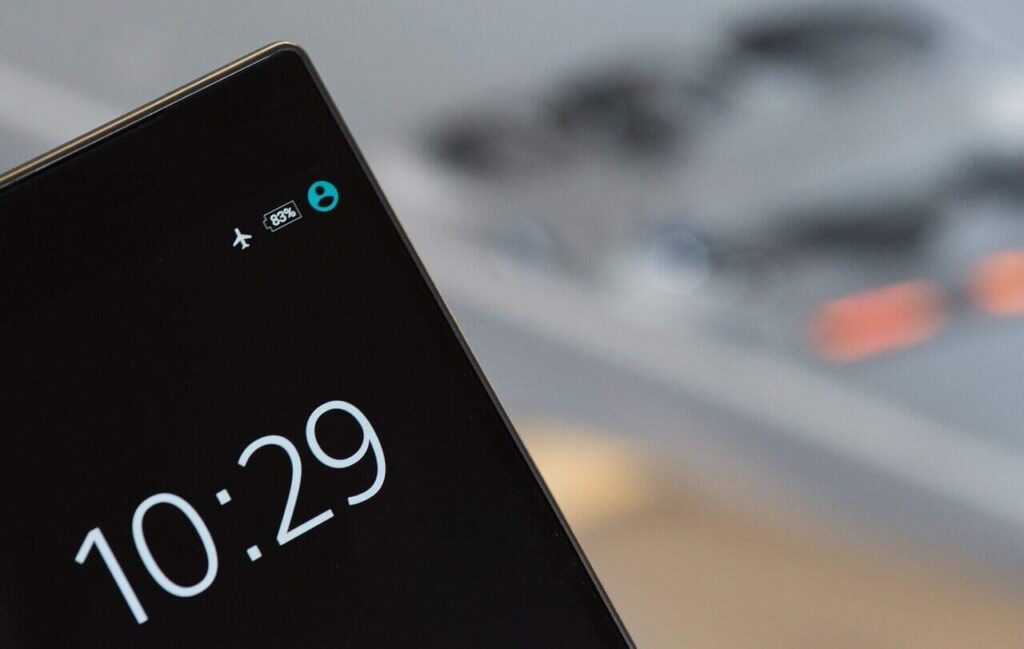 A close-up of a smartphone screen with the 'Airplane Mode' icon activated.