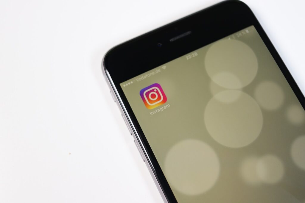  A close-up of a phone with the Instagram icon displayed on the screen